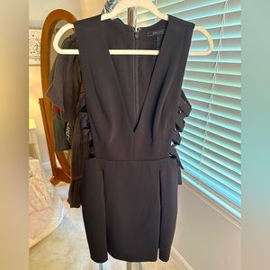 So cute!!! BCBG adorable mini, black dress with ties on sides!  Unique LBD